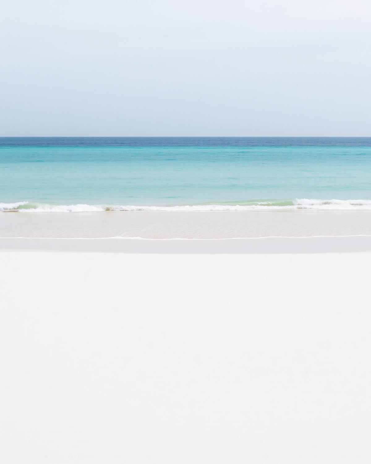 Empty white sand beach and turquoise Atlantic water