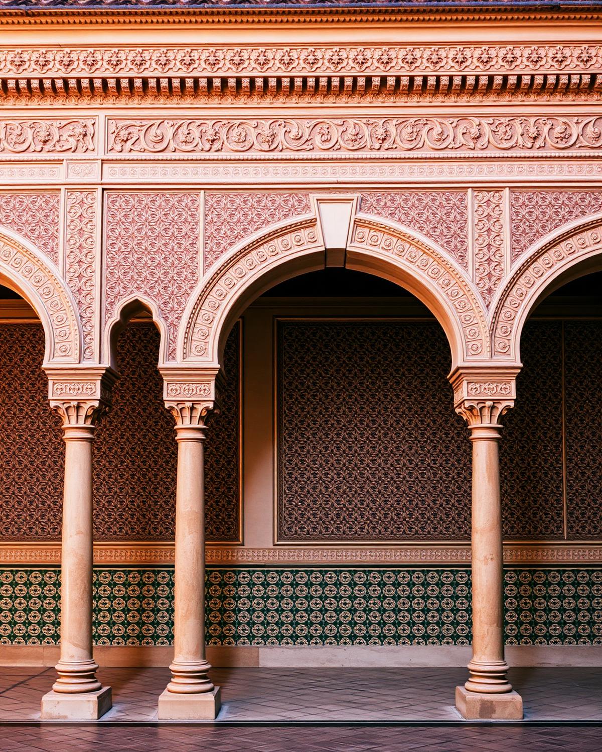 Moorish arches and azulejo tiles in Seville